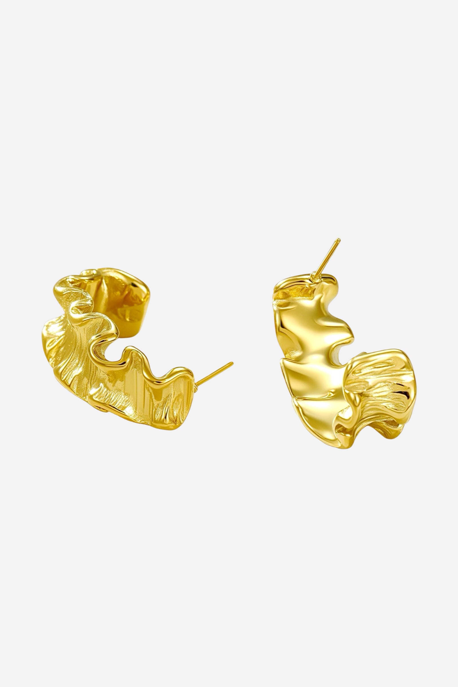Pair of textured wave C-hoop earrings crafted from stainless steel with a polished PVD 18K gold plated finish, featuring sculpted organic curves and fluid design – GLISTIA.