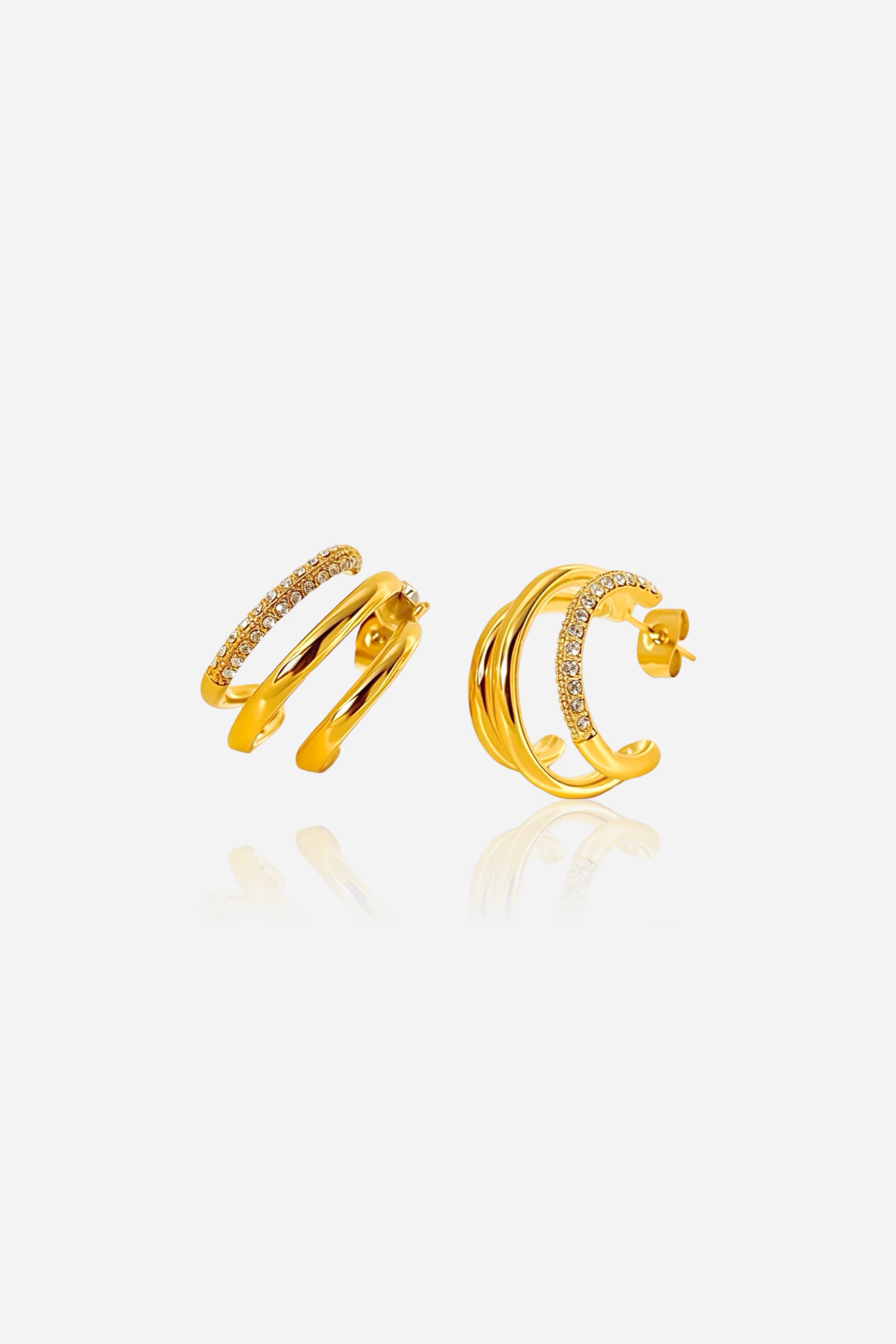 Top view of triple row hoop earrings in 18K gold plated stainless steel with pavé crystal detailing and layered gold design – GLISTIA jewellery