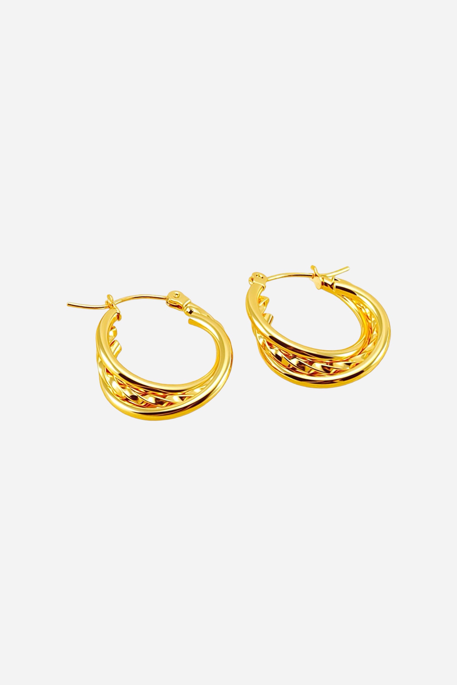 Top view twist detail double hoop earrings crafted in stainless steel with a polished 18K gold plated finish, featuring layered hoops with a braided twist centre – GLISTIA